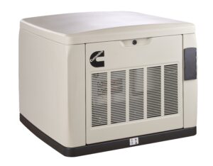 a picture of the exterior of a Cummins residential generator. It is a tan color with air intake vent visible on the front surface and a Cummins logo above the vent, aligned with the left edge of the vent.